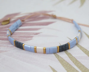 Tila Bead Adjustable Bracelet in Navy Blue, Iridescent Blue, Gold and Iridescent White
